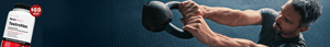 Person lifting a kettlebell with TestoVex supplement bottle in the foreground