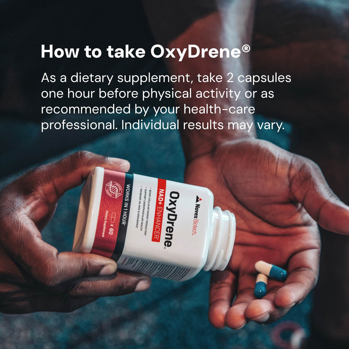 Person holding OxyDrene supplement bottle with capsules in hands, showing usage instructions.
