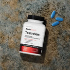 A bottle of Novex Biotech TestroVax, a dietary supplement labeled as a Testosterone Booster containing 90 capsules. The label indicates it is clinically tested to boost testosterone, associated with muscle mass growth, increased energy, and intensified sex drive. 